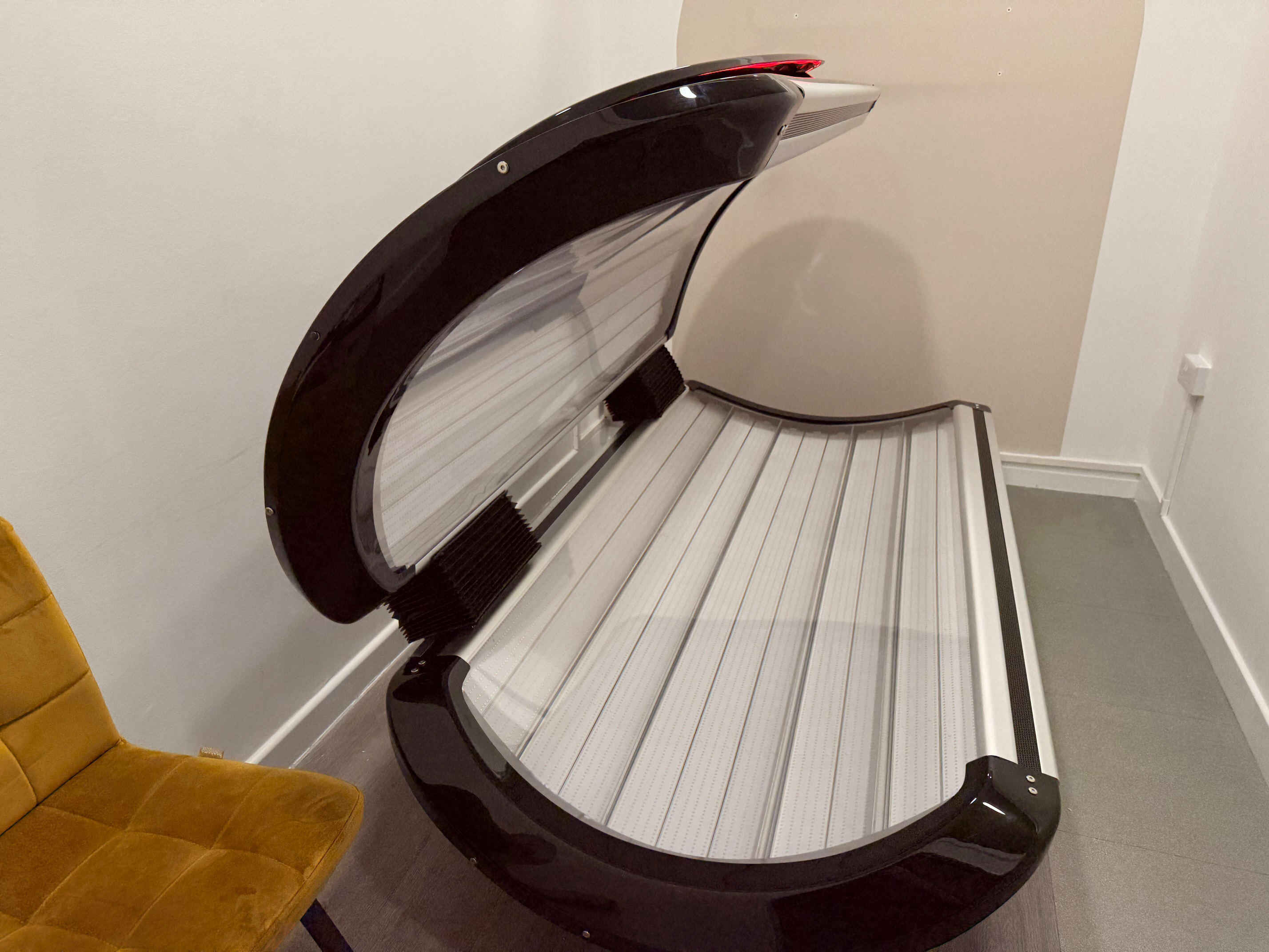 Open red light therapy bed ready for a session